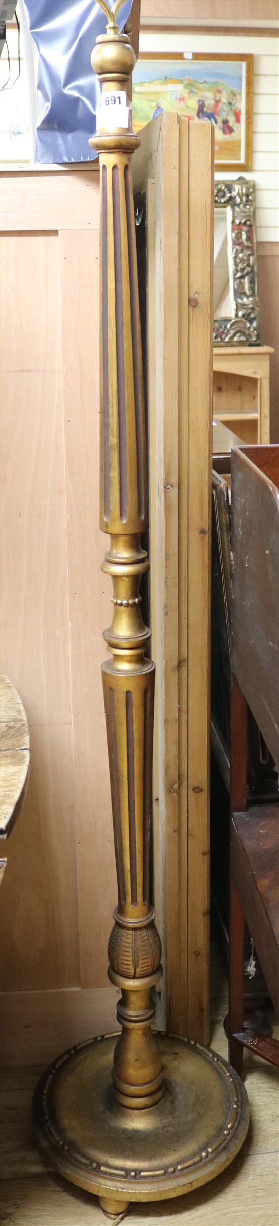 A gilt lamp standard